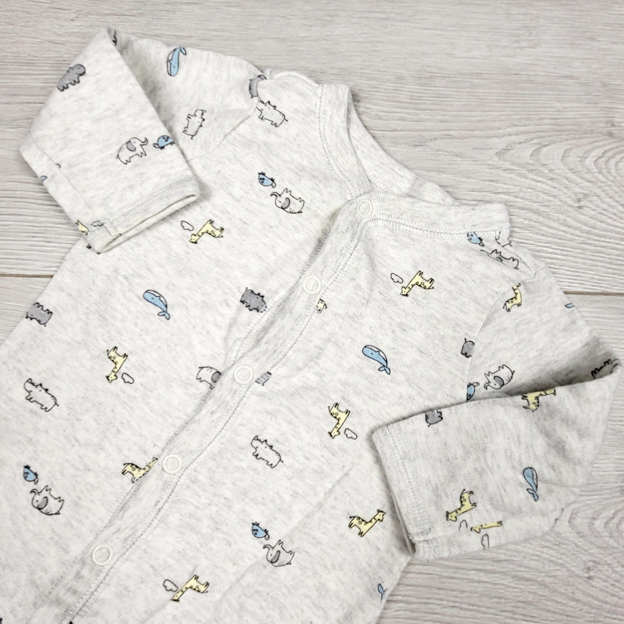KRML1 - Carters grey cotton sleeper with safari animals. Size 6 months