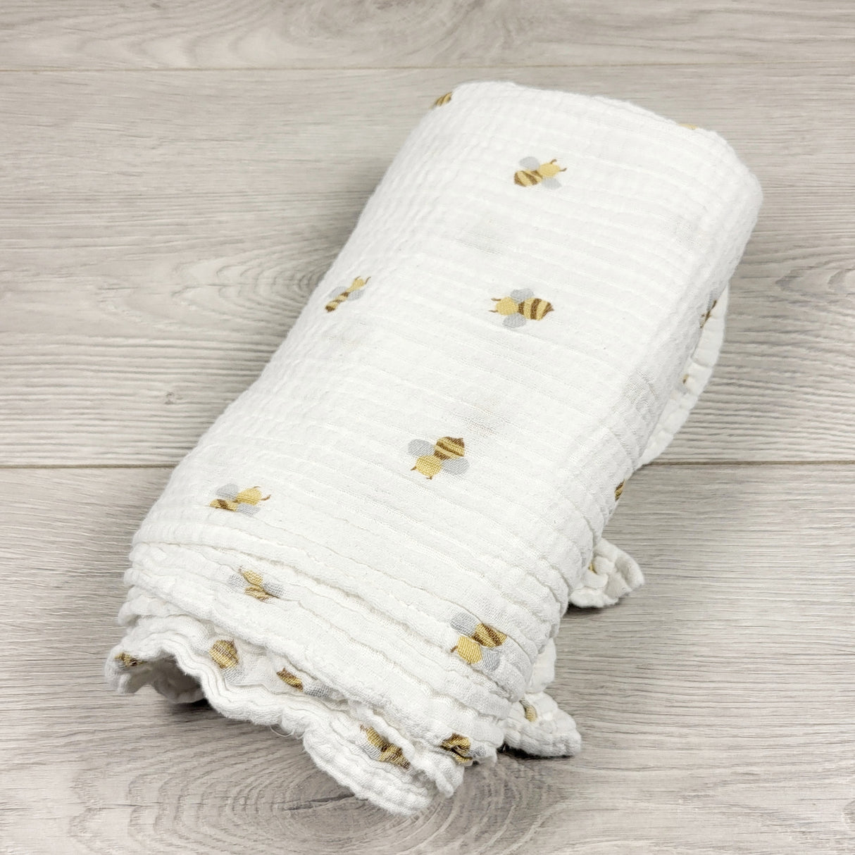 Lulujo muslin cotton swaddle with bumblebees
