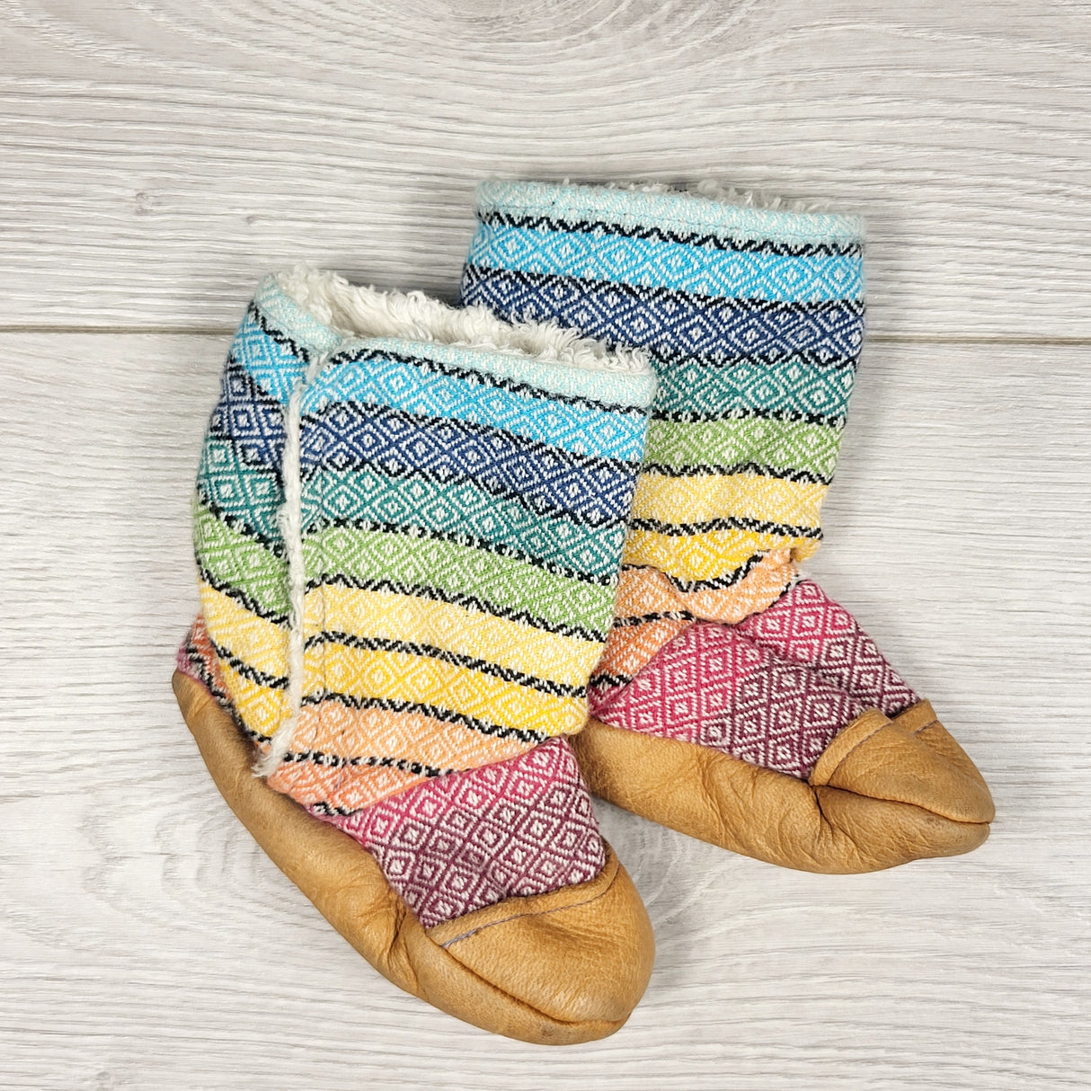Handmade rainbow booties with leather soles. Size like 0-6 months