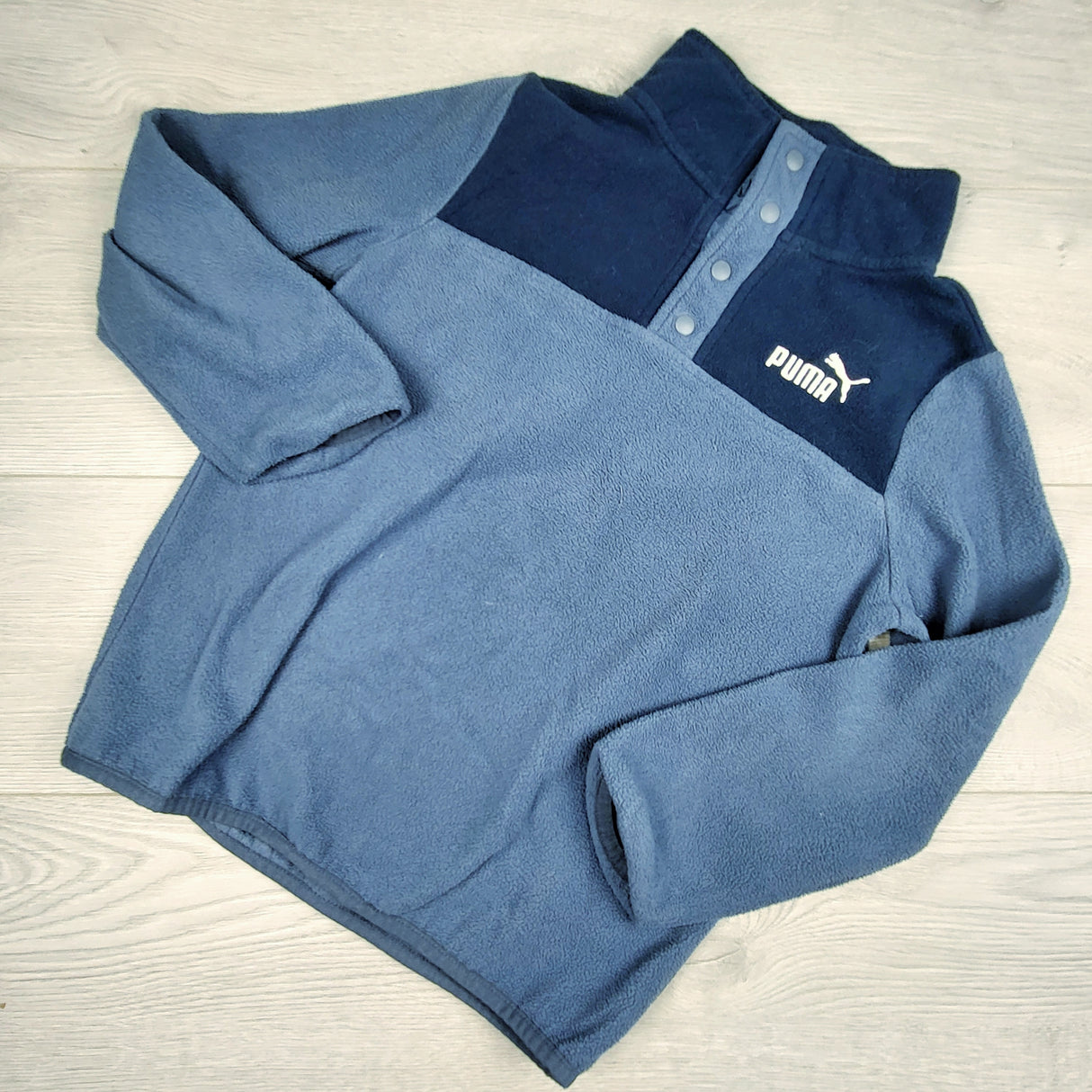 Puma blue fleece pullover jacket. Size 7/8