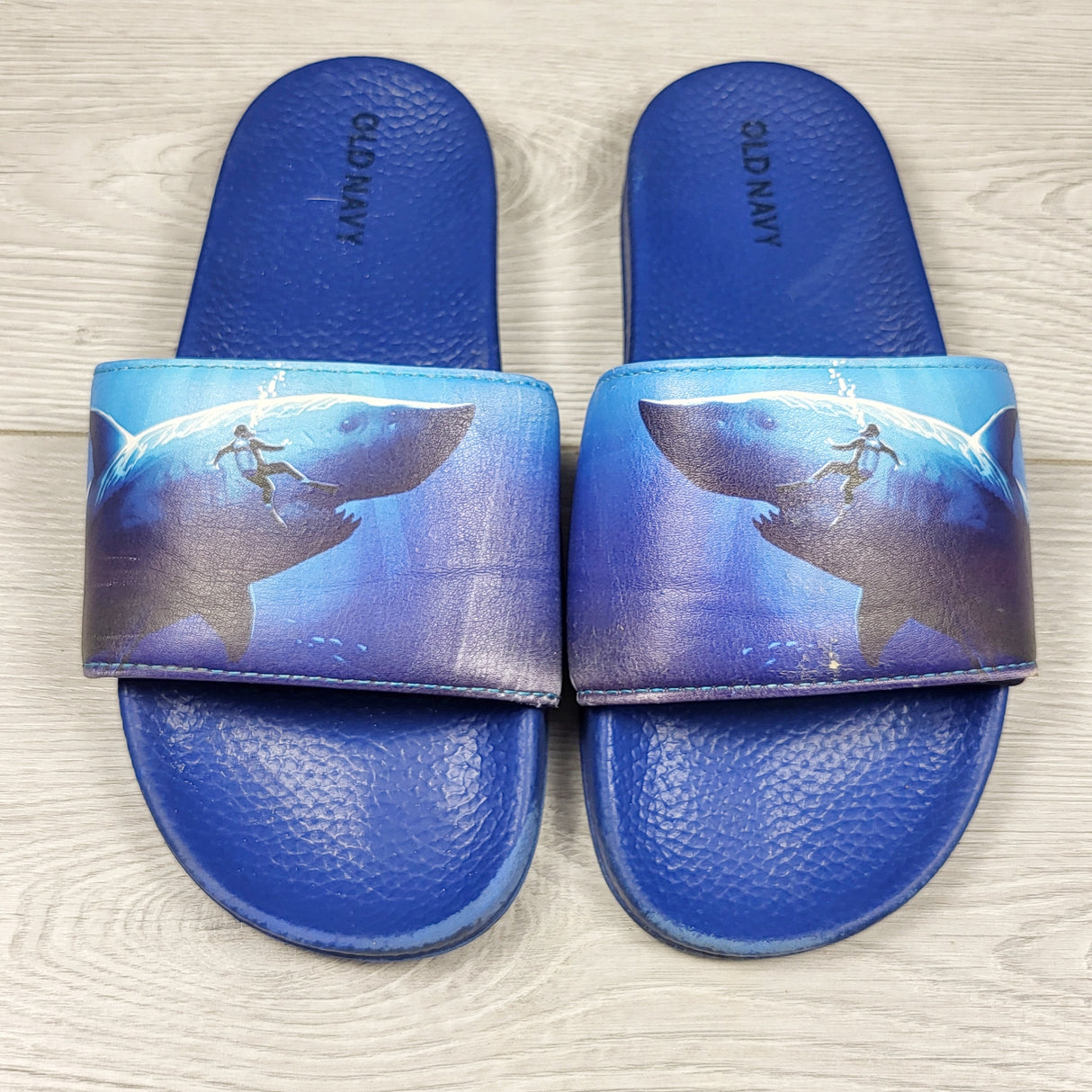 Old Navy blue slide sandals with surfer. Youth size 1/2