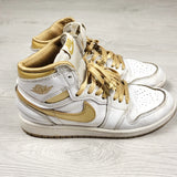 Nike white and gold retro Air Jordan 1 hightop sneakers. Youth size 2
