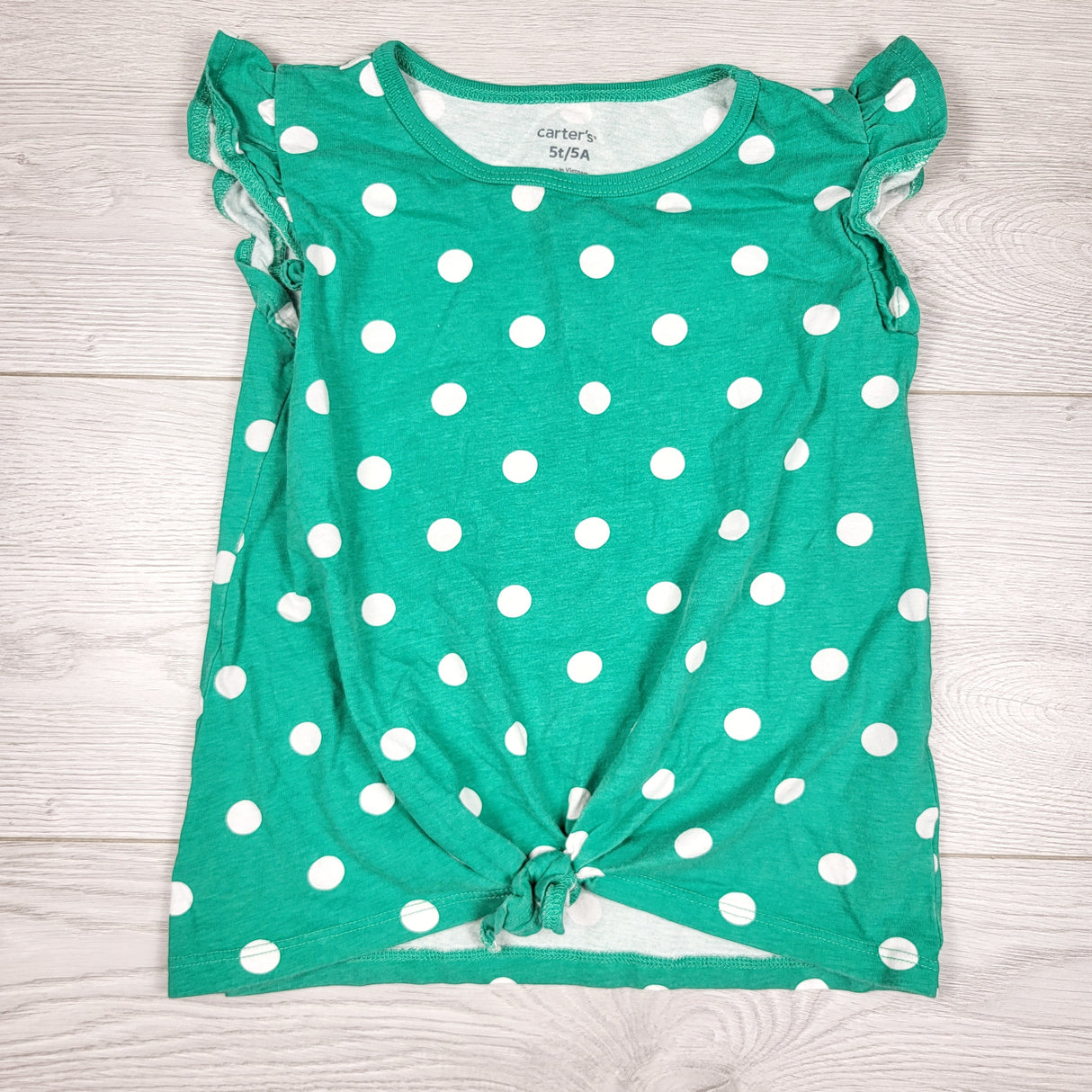 Carters green polka dot knotted top. Size 5T