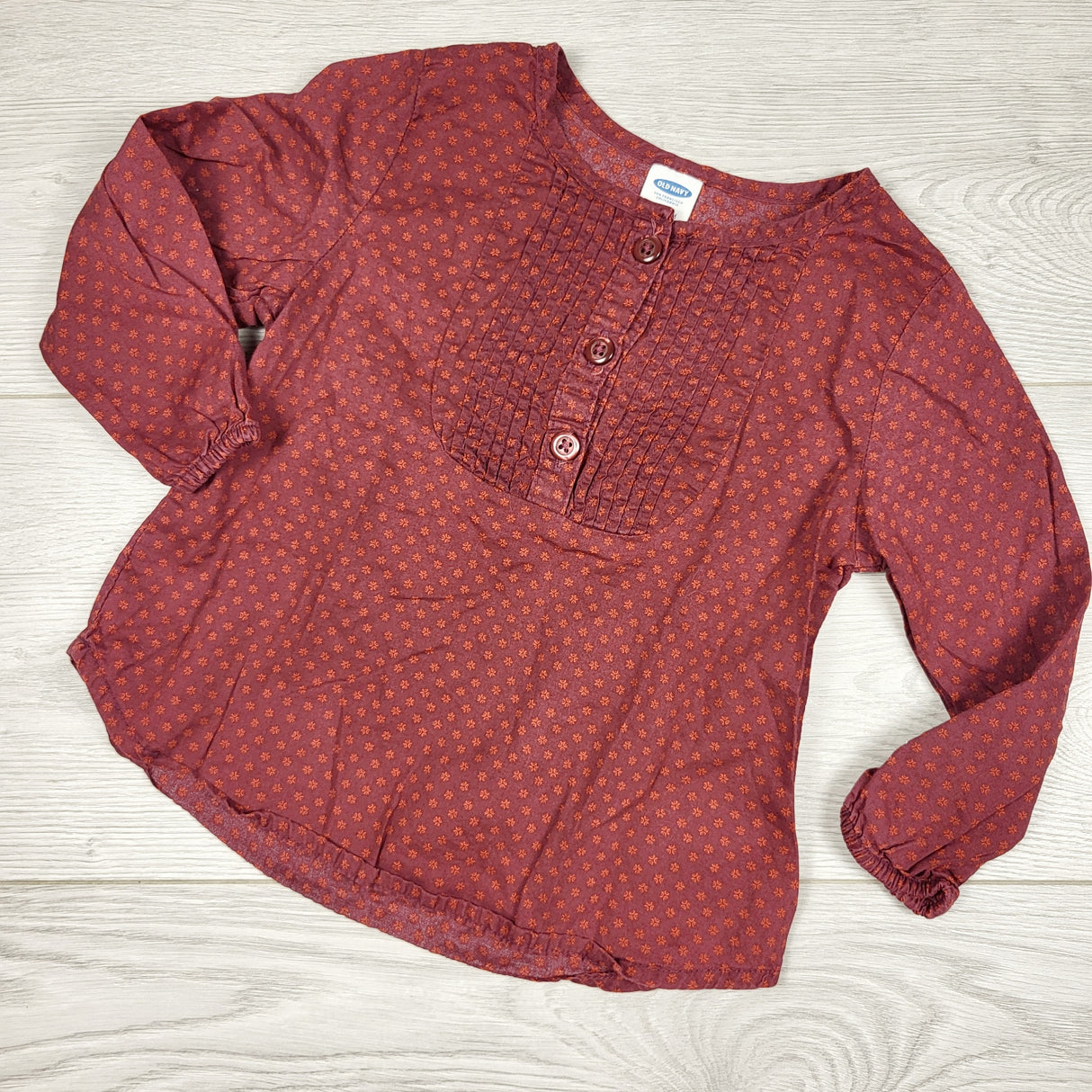 Old Navy burgundy floral print top. Size 12-18 months