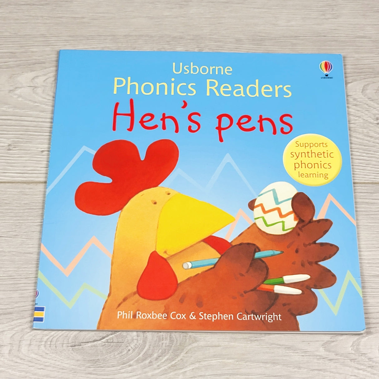 Hen's Pens. Soft cover Usborne phonics book