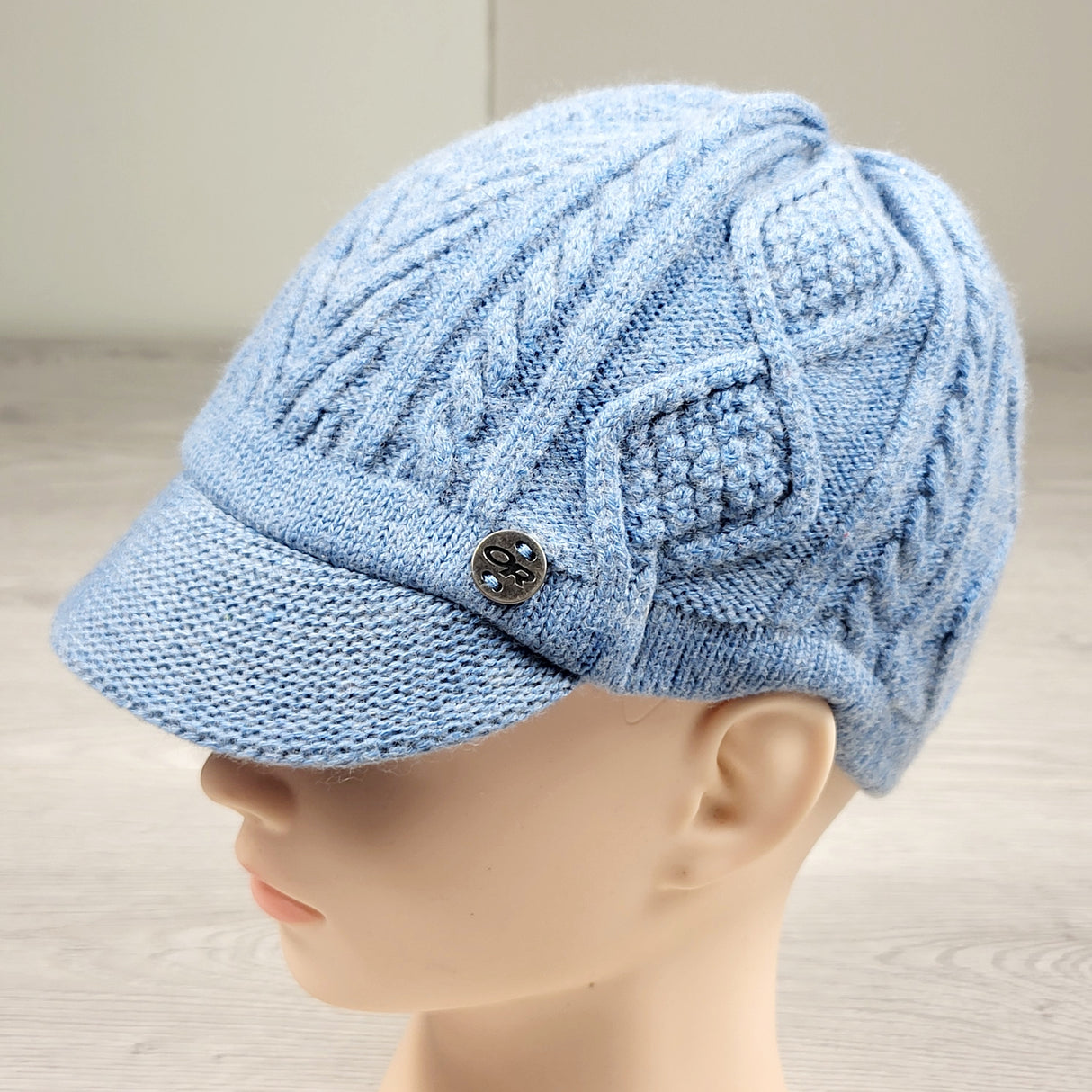 Outdoor Research blue cable knit cap. One size fits all