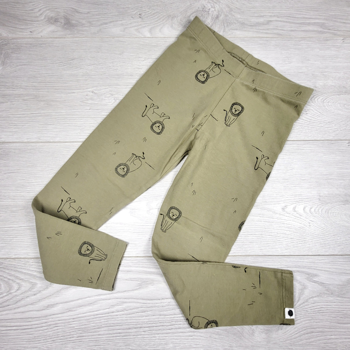 Rise Little Earthling green lion leggings. Size 4/5T