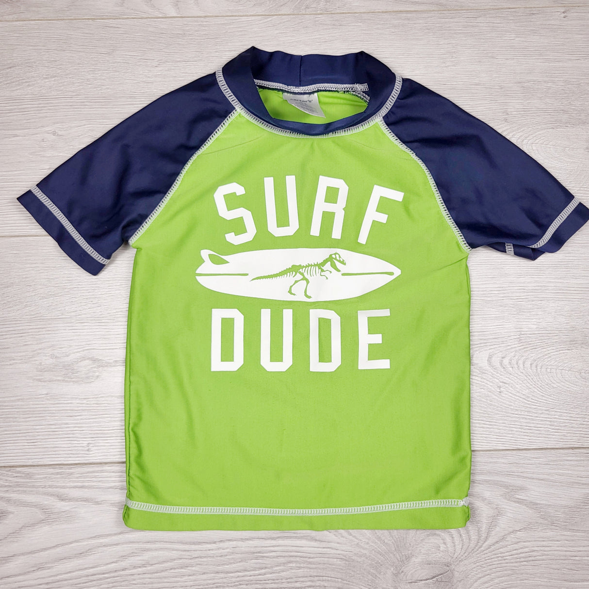 Carters navy and green "Surf Dude" rash guard. Size 2T