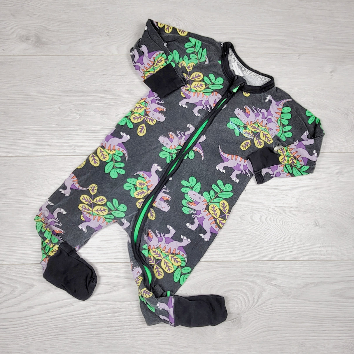 Bonds wondersuit with dinosaurs. Size 6-12 months