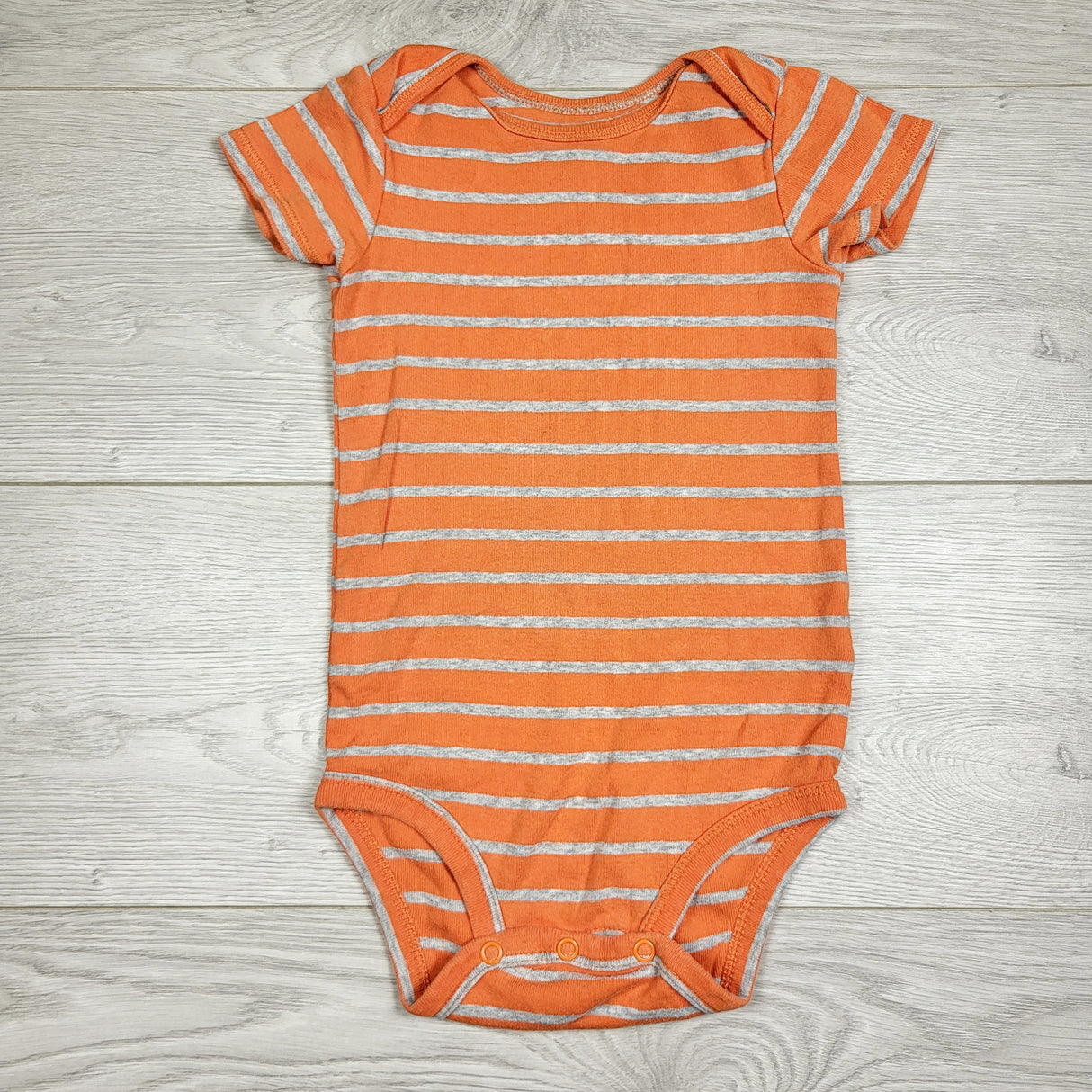 Carters orange and grey striped bodysuit. Size 24 months