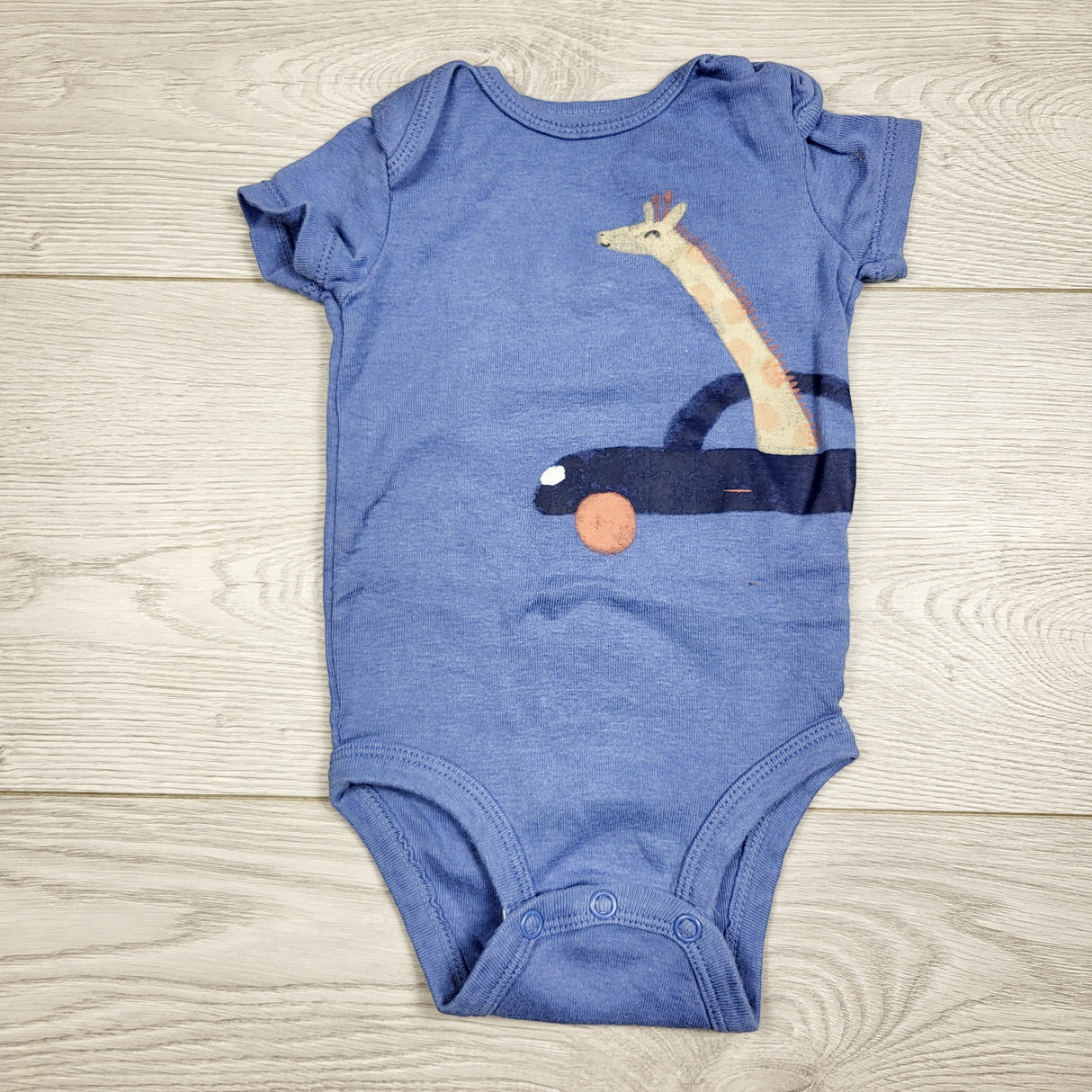 Carters blue bodysuit with giraffe in car. Size 3 months