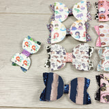 Lot of faux leather bow hair clips