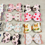 Lot of faux leather bow hair clips