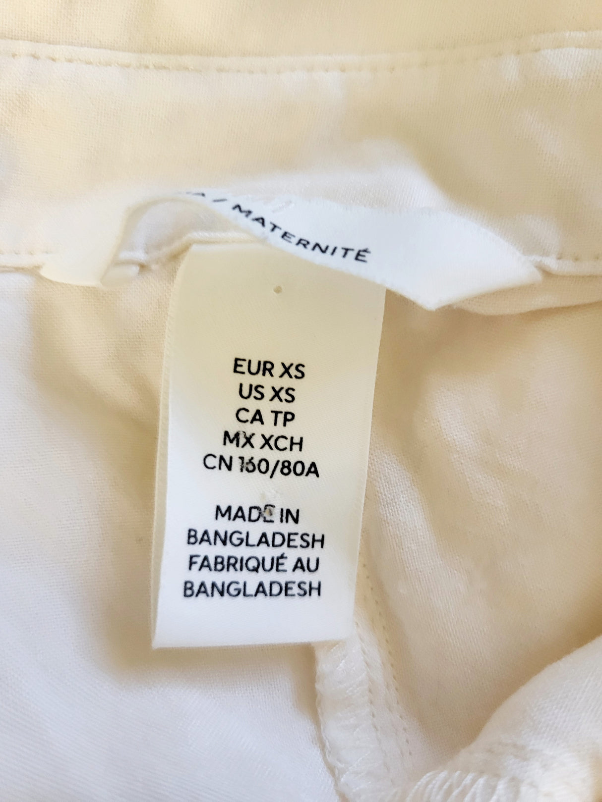 H and M cream coloured button down maternity top. Size XS