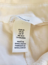 H and M cream coloured button down maternity top. Size XS