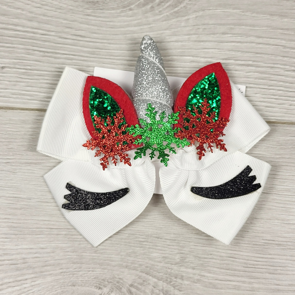 NEW - Claire's Christmas unicorn bow clip