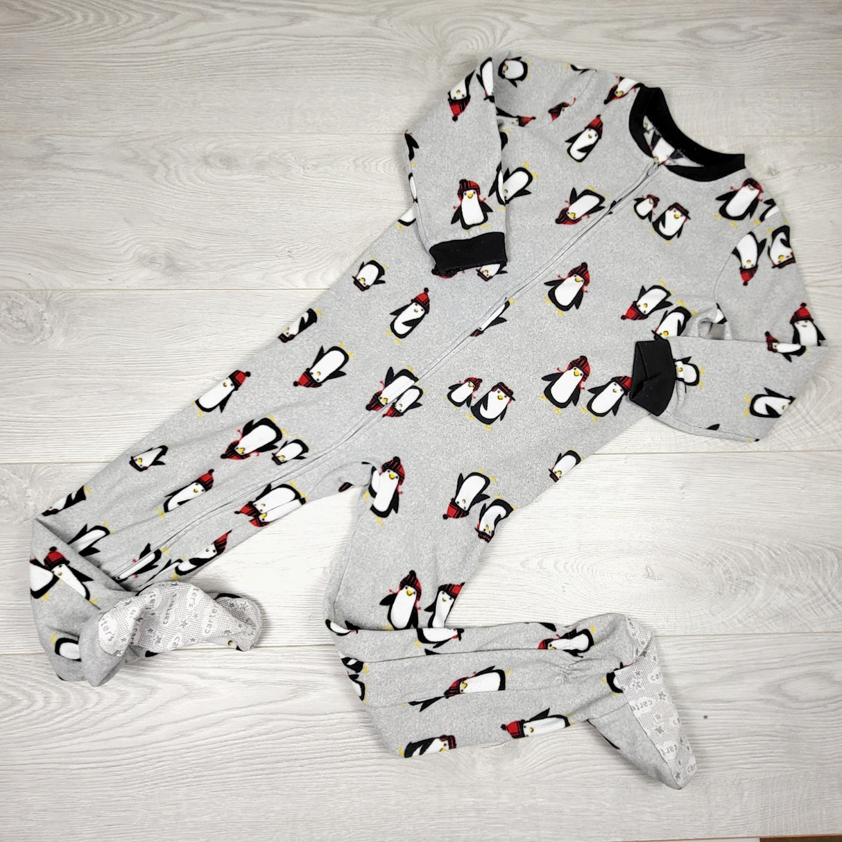 Carters grey zippered fleece sleeper with penguins. Size 6