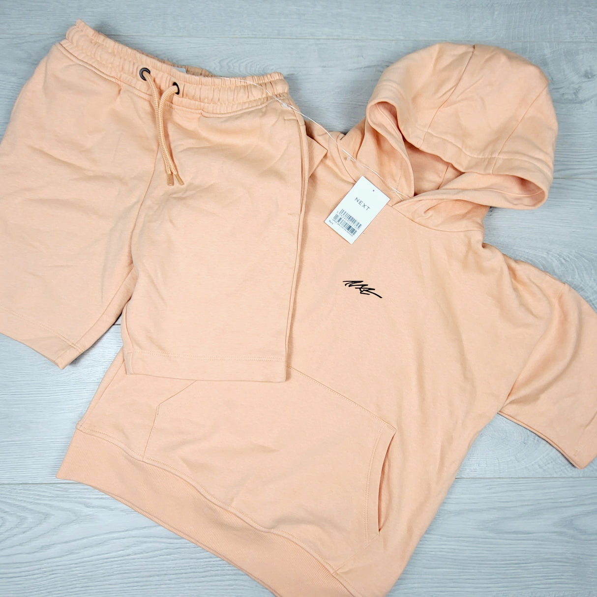 NEW - Next peachy orange 2pc set. Size 9