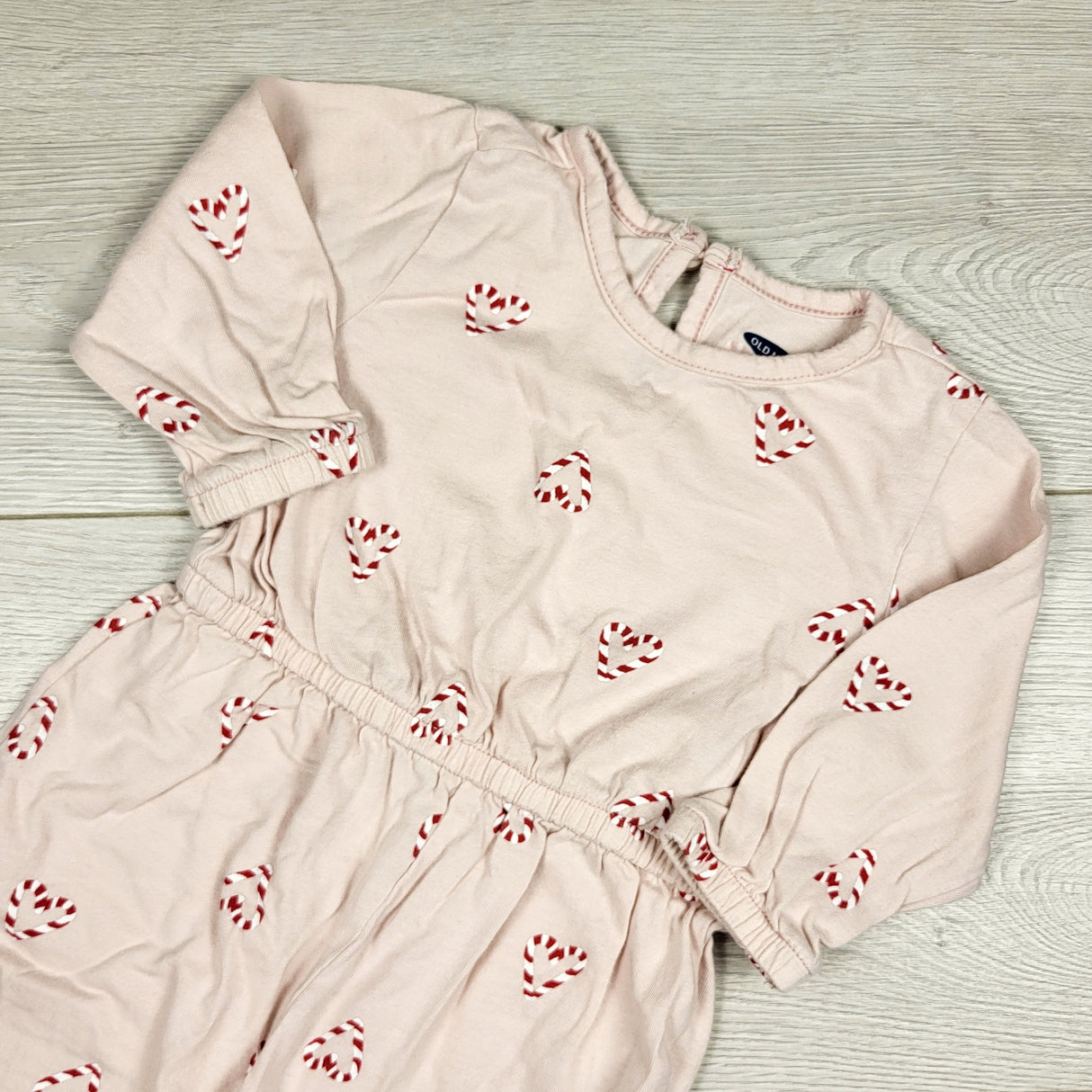 Old Navy pink romper with candy cane hearts. Size 6-12 months