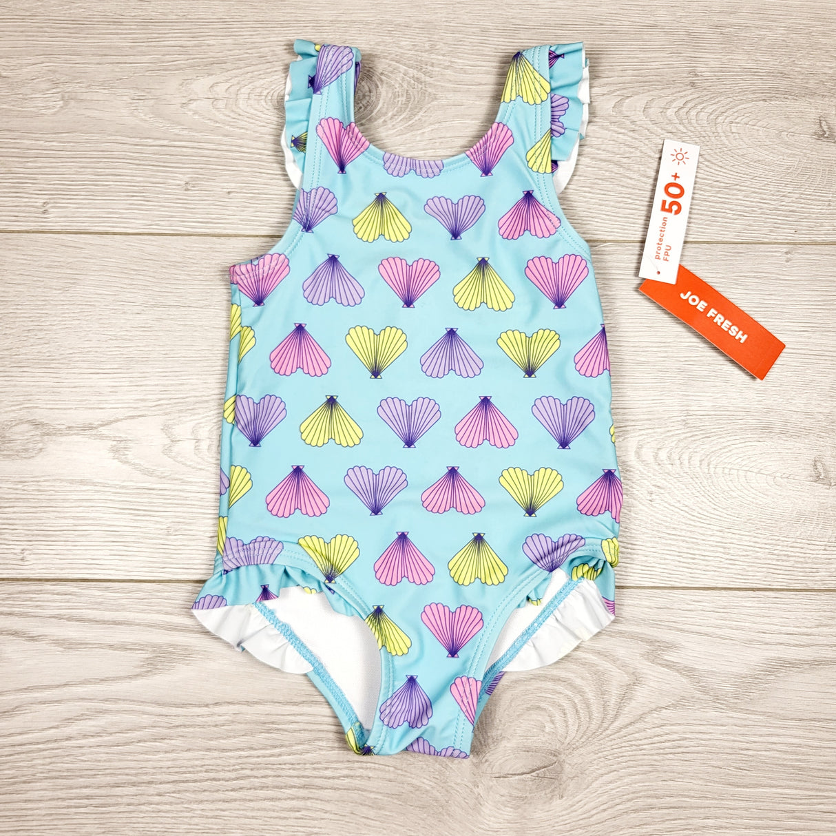 NEW - Joe blue one piece swimsuit with seashell hearts. Size 6-12 months