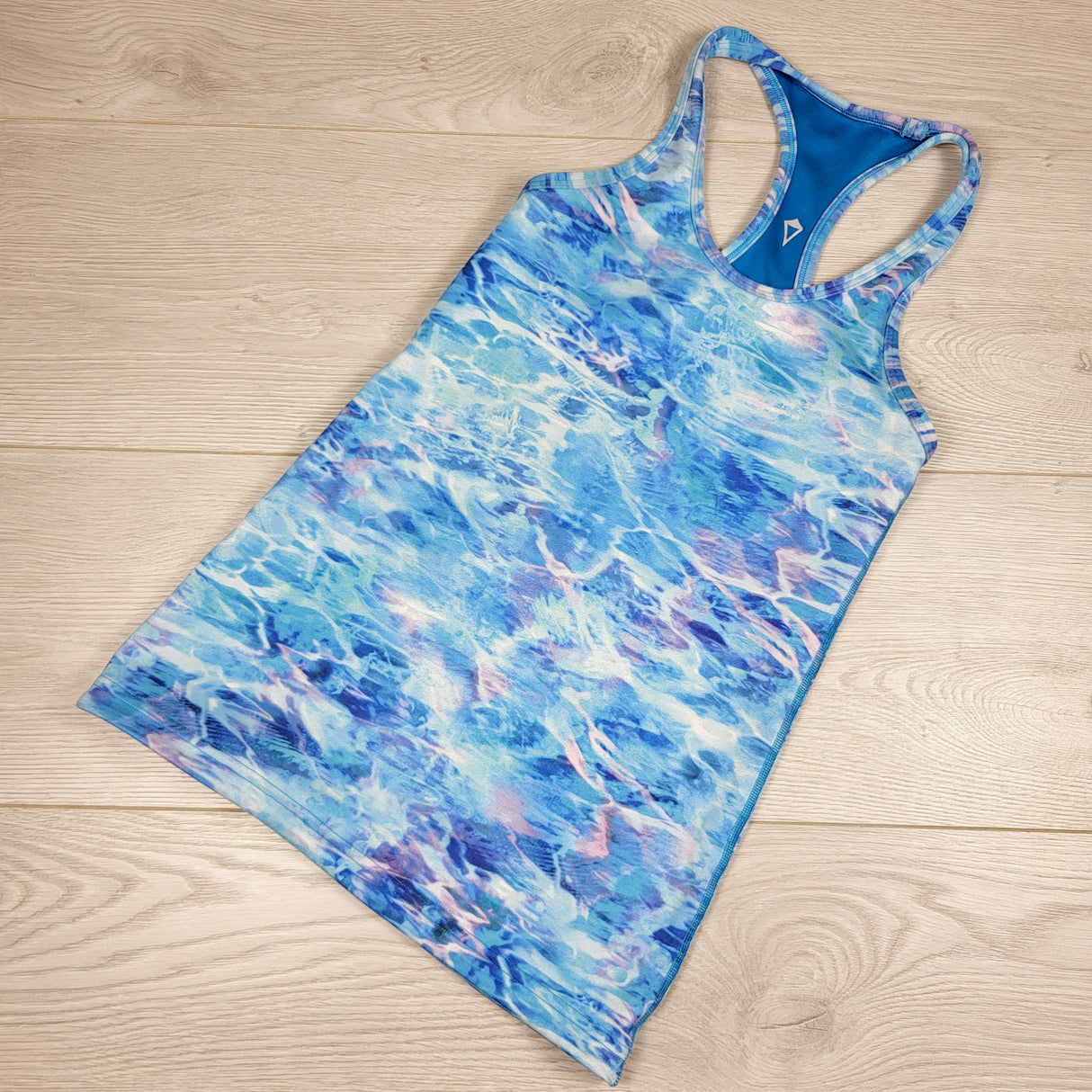 LHEP3 - Ivivva (Lululemon) blue reversible active tank top. Sizes like an 8/9