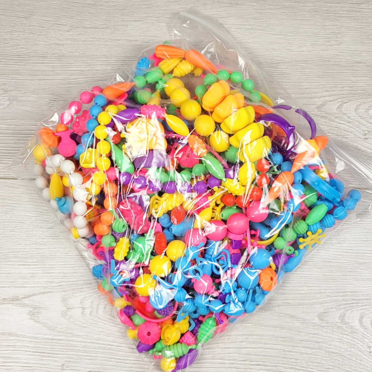 Lot of plastic pop bead toys