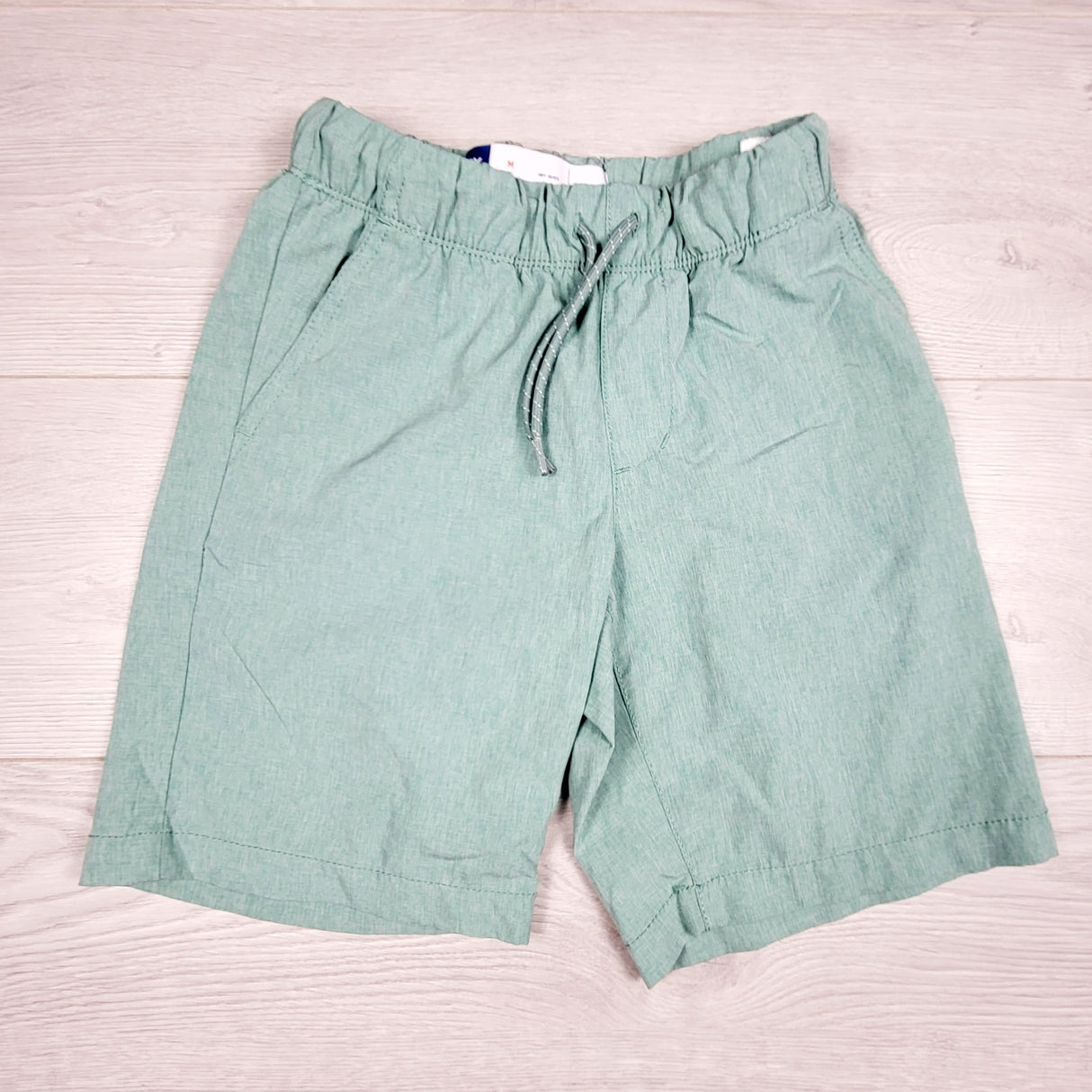 Old Navy light green quick dry drawstring shorts. Size 8