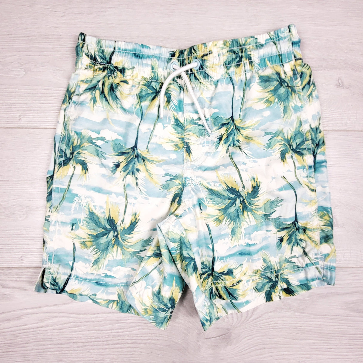 Old Navy swim shorts with palm trees. Size 8