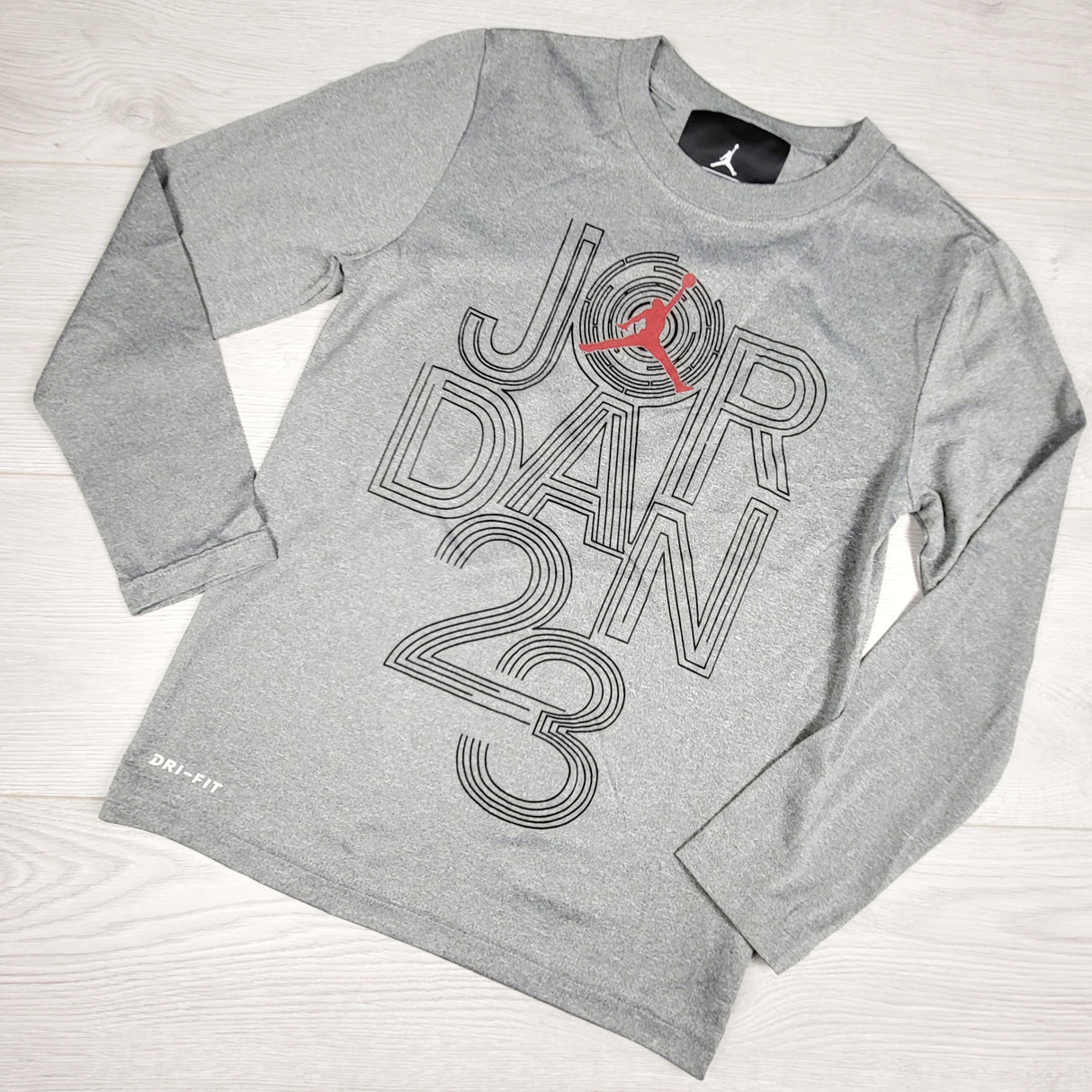 Nike grey Air Jordan 23 long sleeve quick dry shirt. Size 8-10 Years