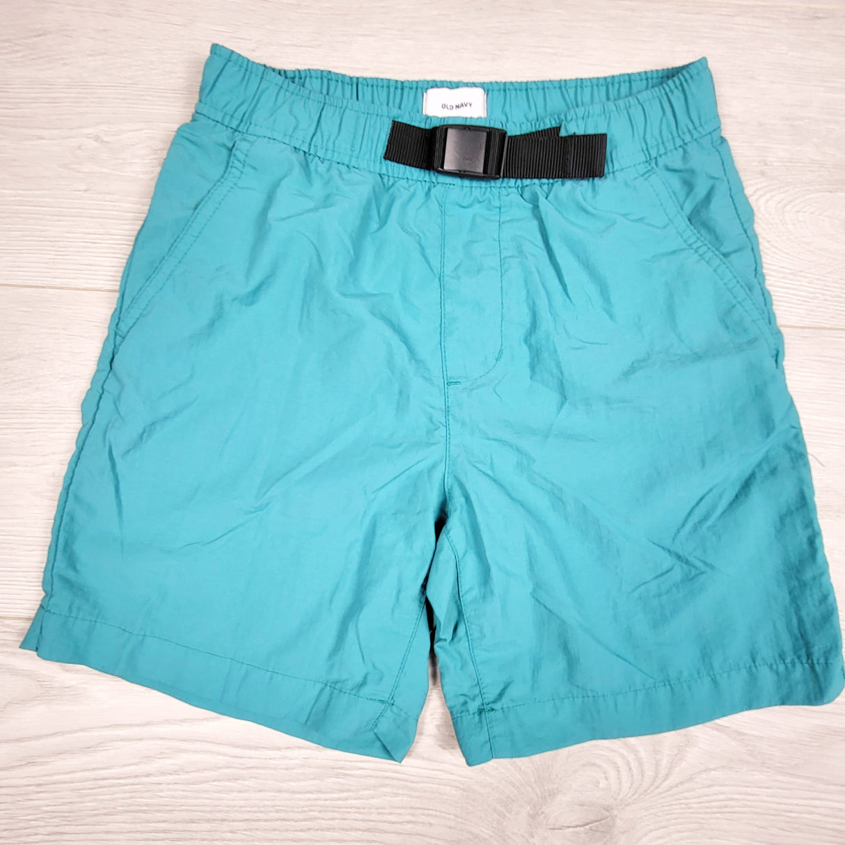 Old Navy turquoise hybrid board shorts. Size 8