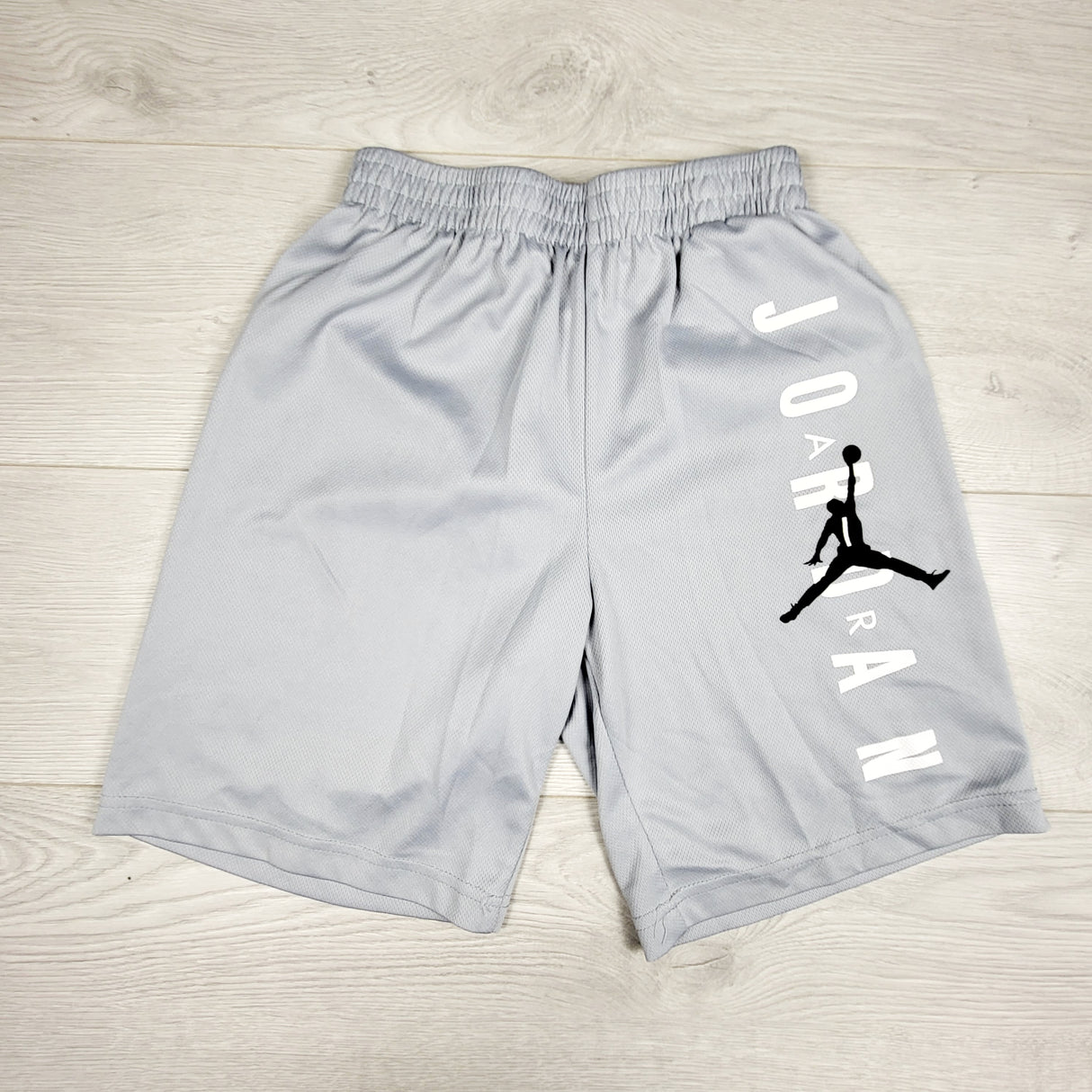 Nike Air Jordan grey jumpman shorts. Size 8-10 Years