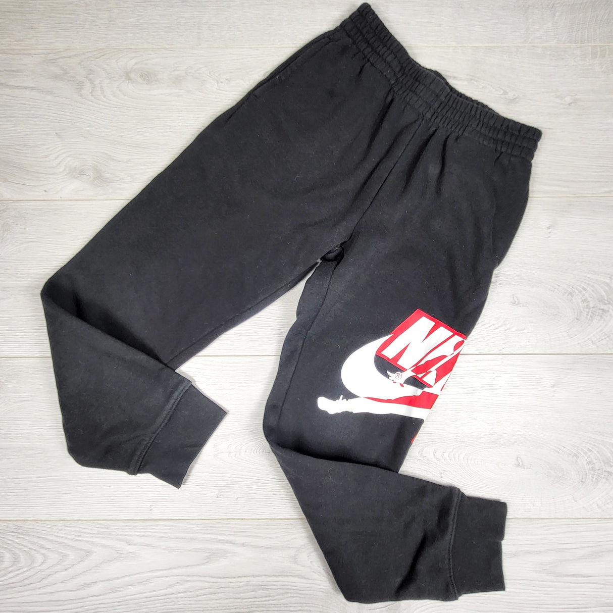 Nike Air black fleecy lined joggers. Size 8-10 Years