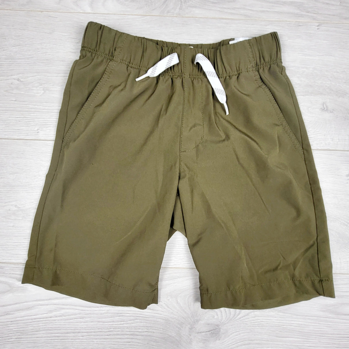 Old Navy olive green board shorts. Size 8