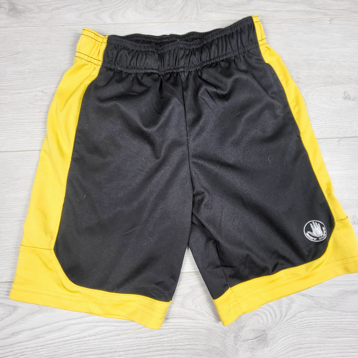 Body Glove black and yellow active shorts. Size 8