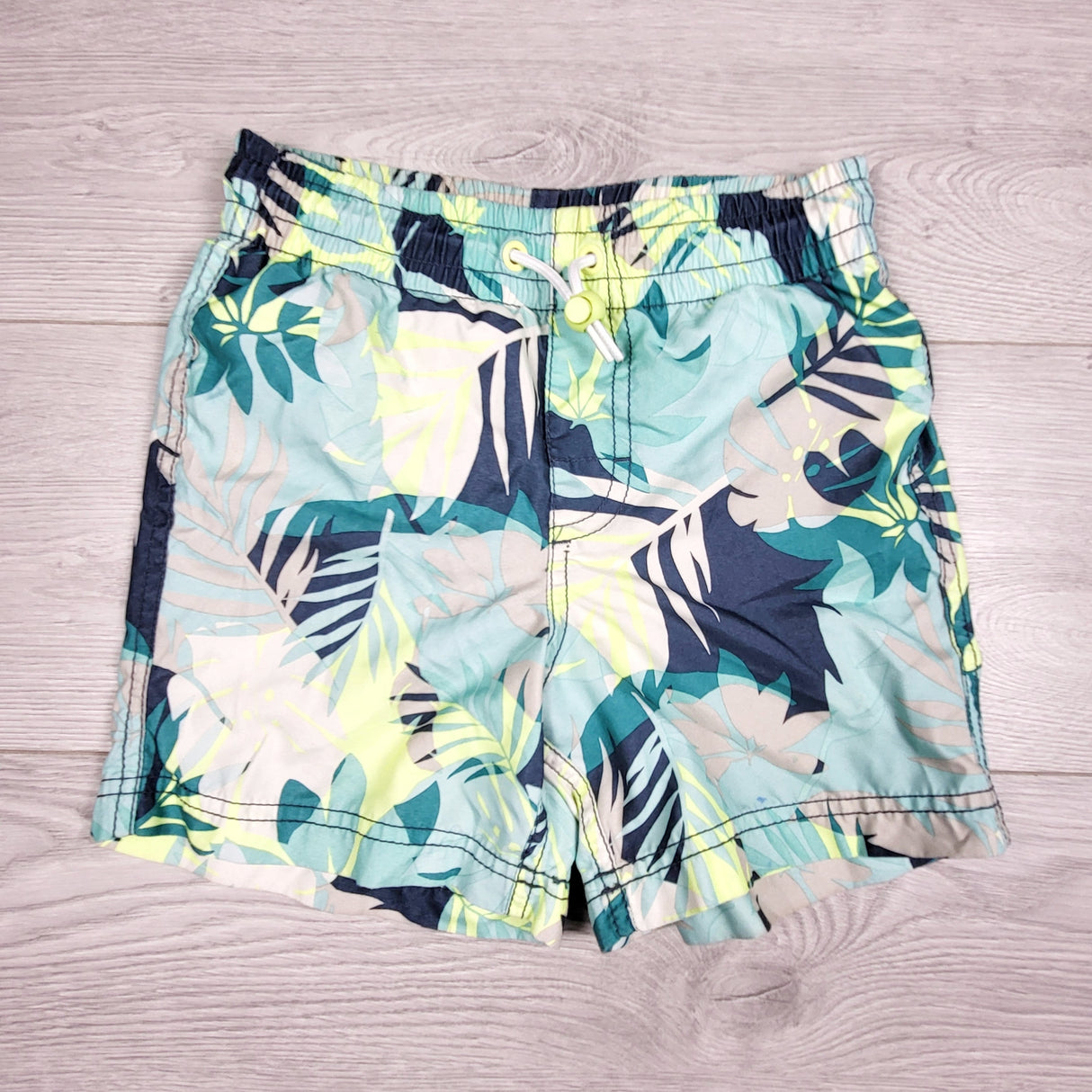 Old Navy leaf printed swim shorts. Size 6/7