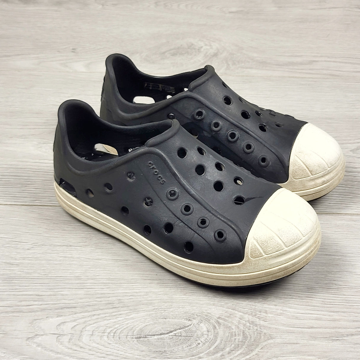 Crocs brand black "Bump-It" slip on shoes. Size 11