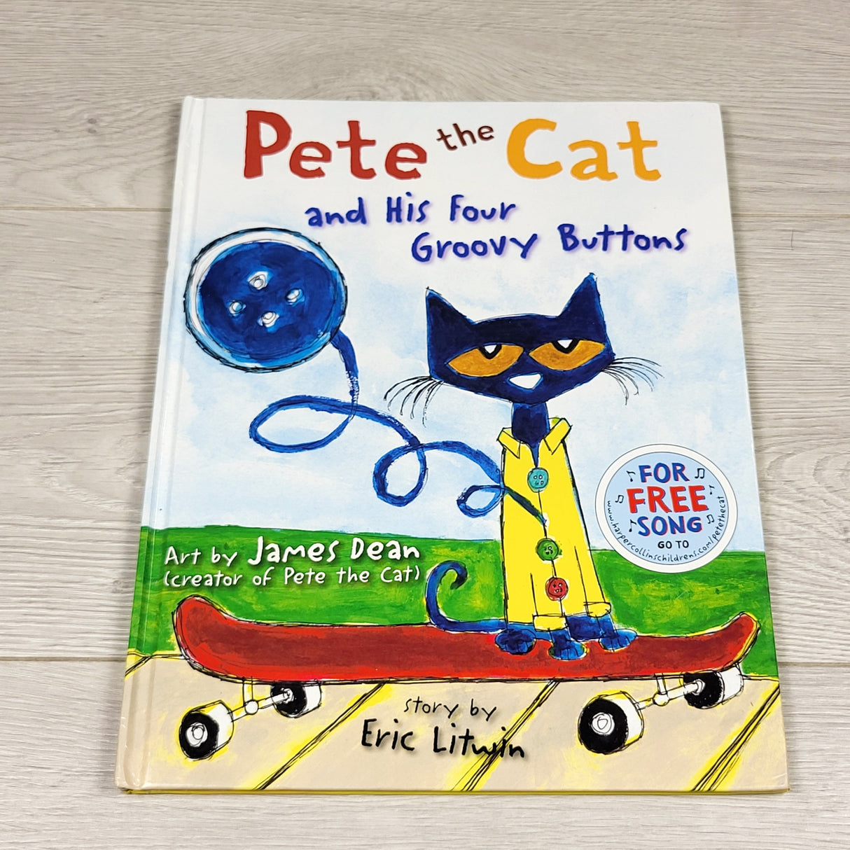 Pete the Cat and His Four Groovy Buttons. Hardcover book