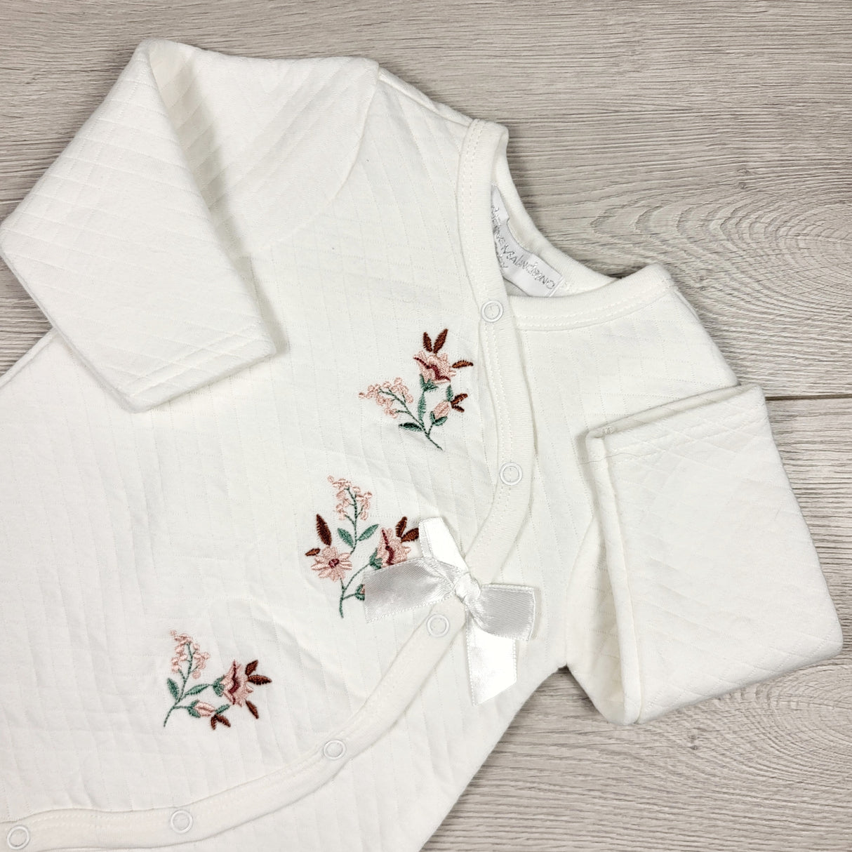 Catherine Malandrino white quilted romper with flowers. Size 6-9 months