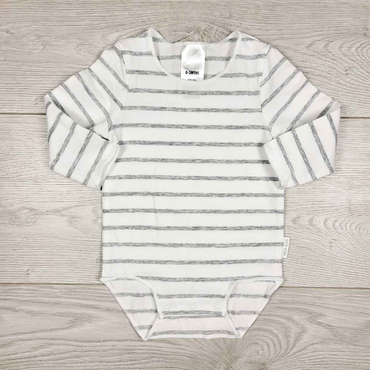 Bonds white and grey bodysuit. Size 0-3 months