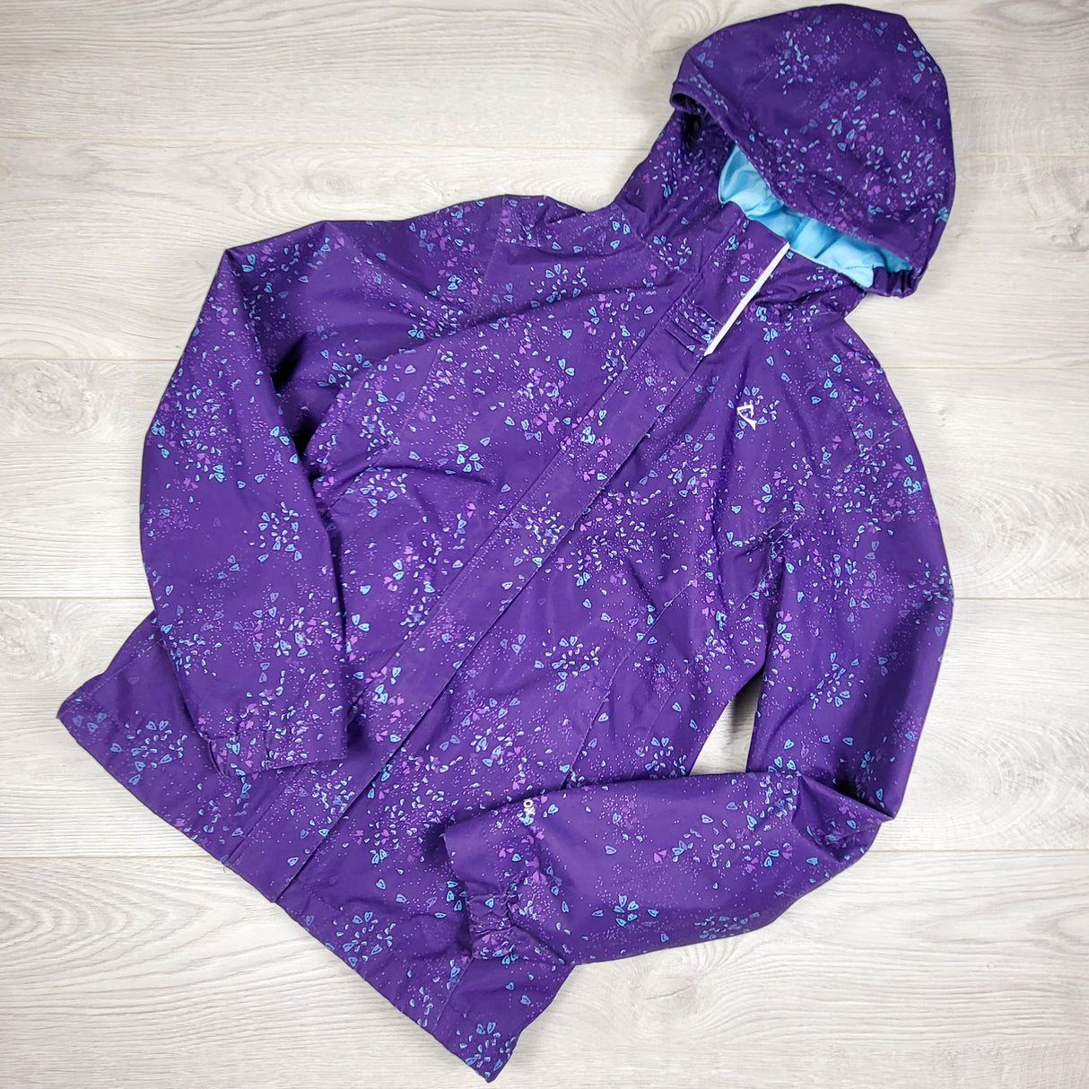 Paradox purple patterned fleece lined hooded rain jacket. Size 14/16