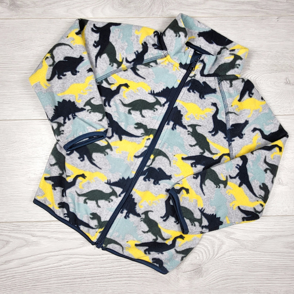 H and M grey zip up fleece dinosaur coat. Size 2-4T