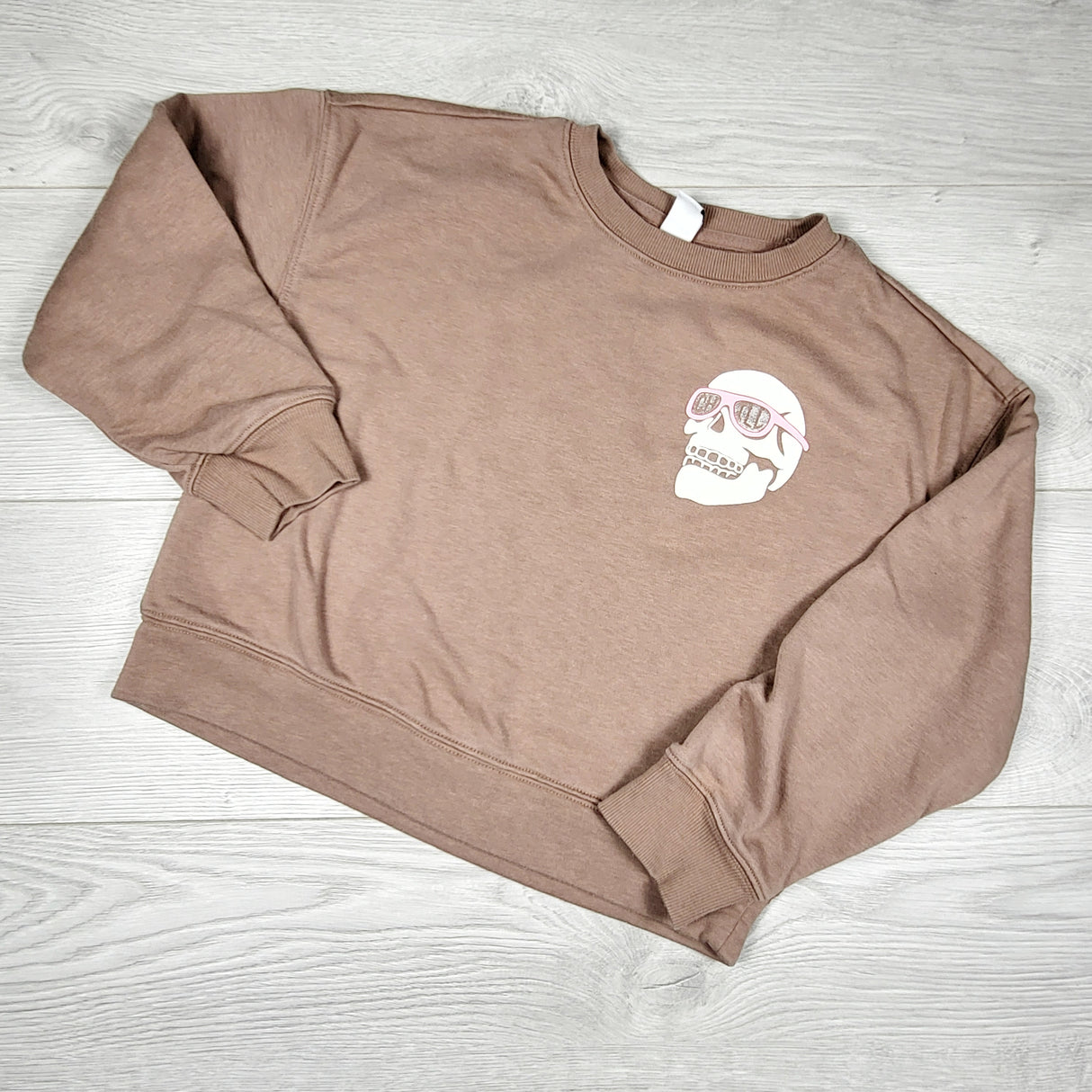 Old Navy brown cropped sweatshirt with skull. Size 8