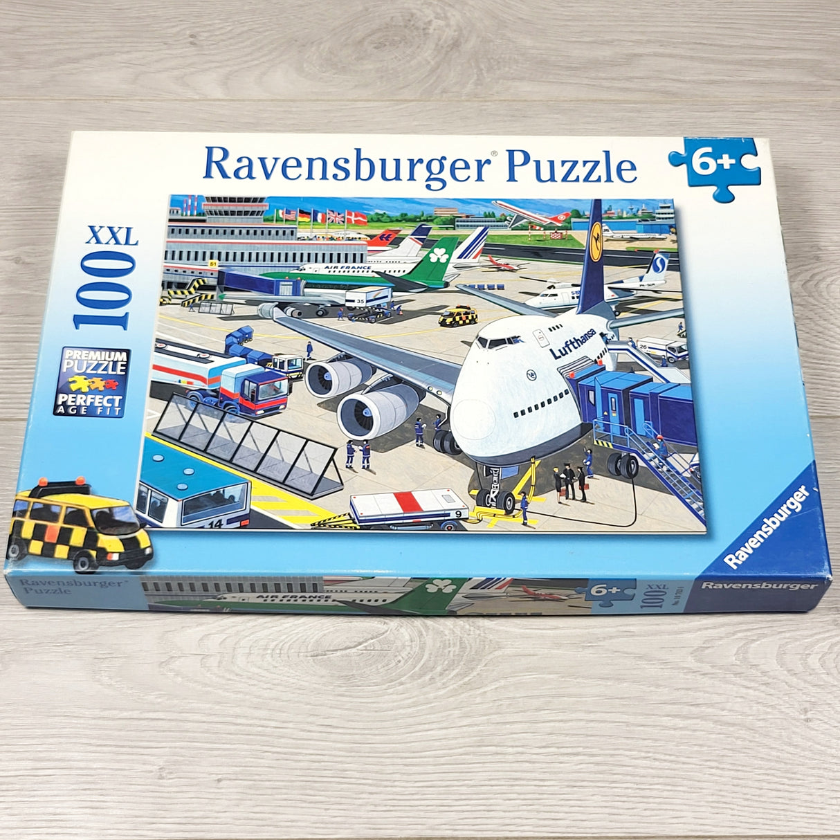 Ravensbuger 100pc with airport scene.