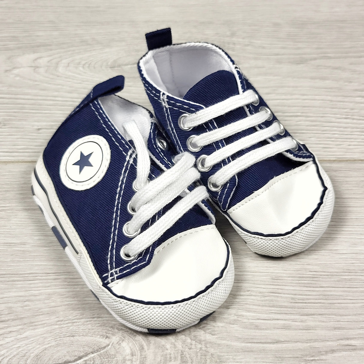 Blue canvas soft soled shoes. Size like an infant size 3