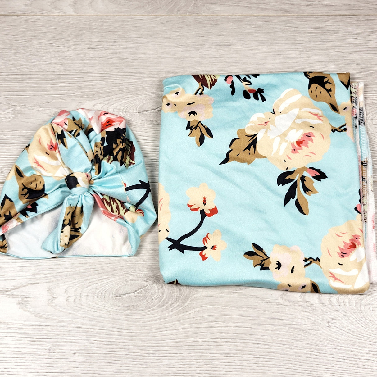 Blue floral print swaddle blanket and matching hat. Approx 0-6 months