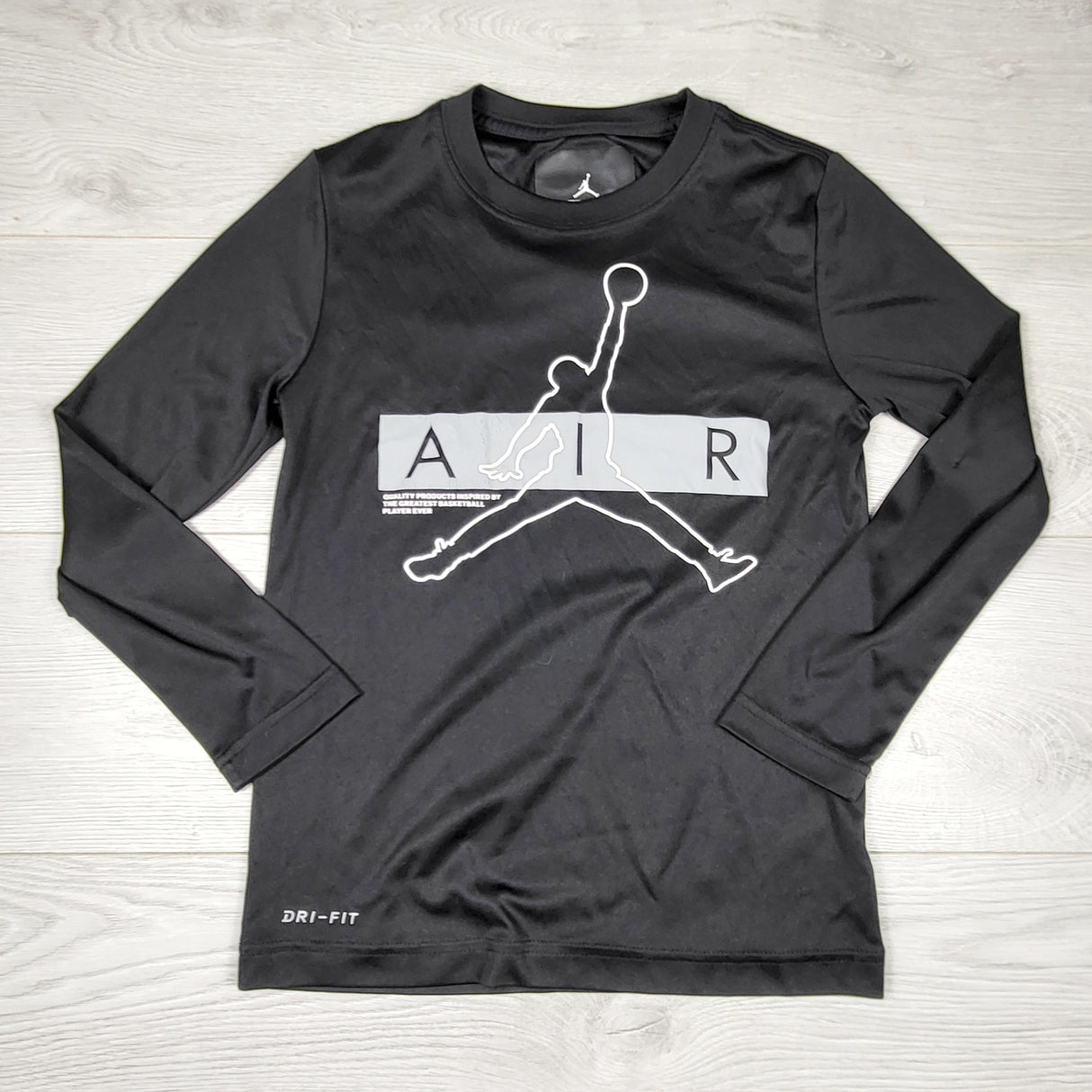 Nike black "Air"long sleeved active top. Size 8-1O Years