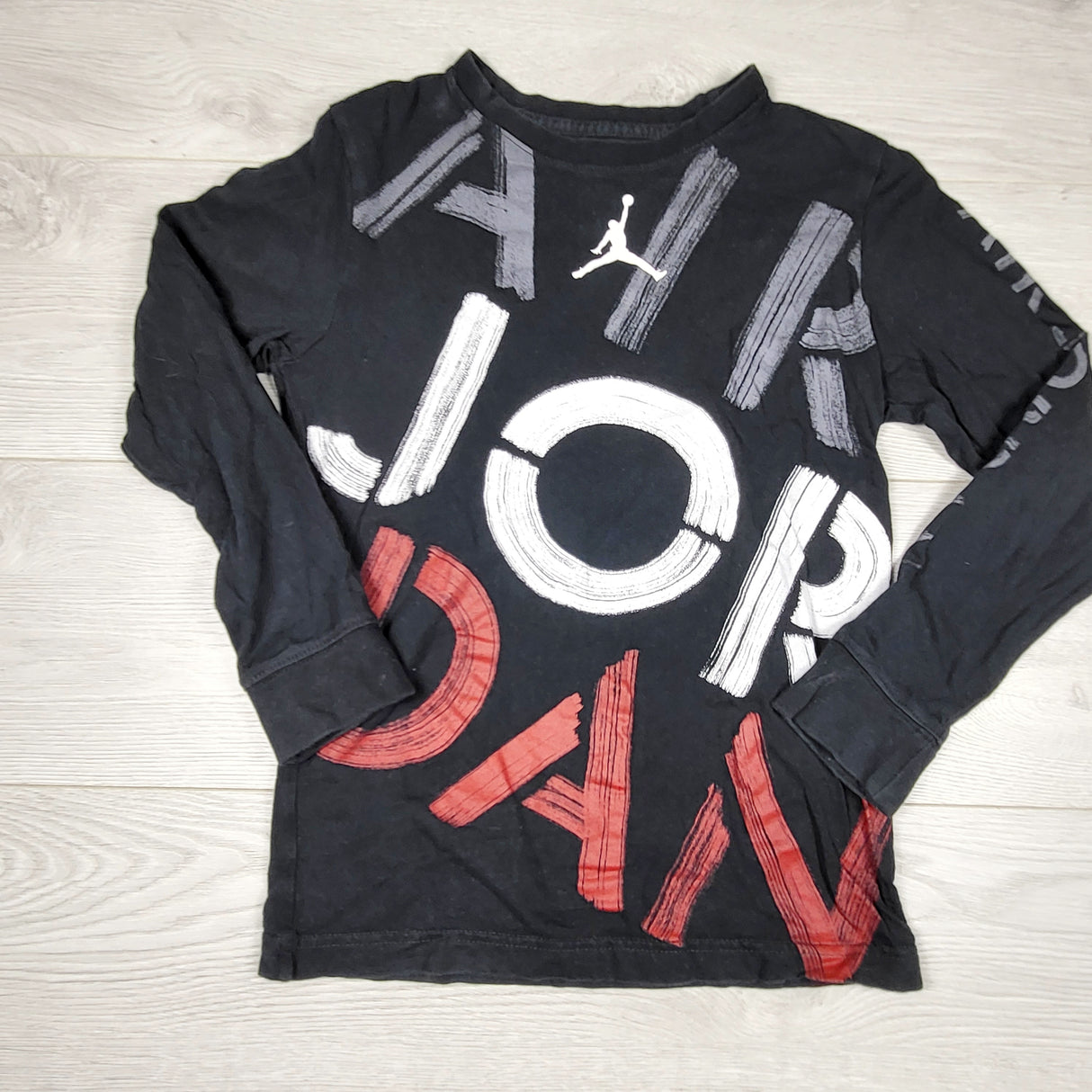 Nike black cotton Air Jordan top. Size 8-10 Years