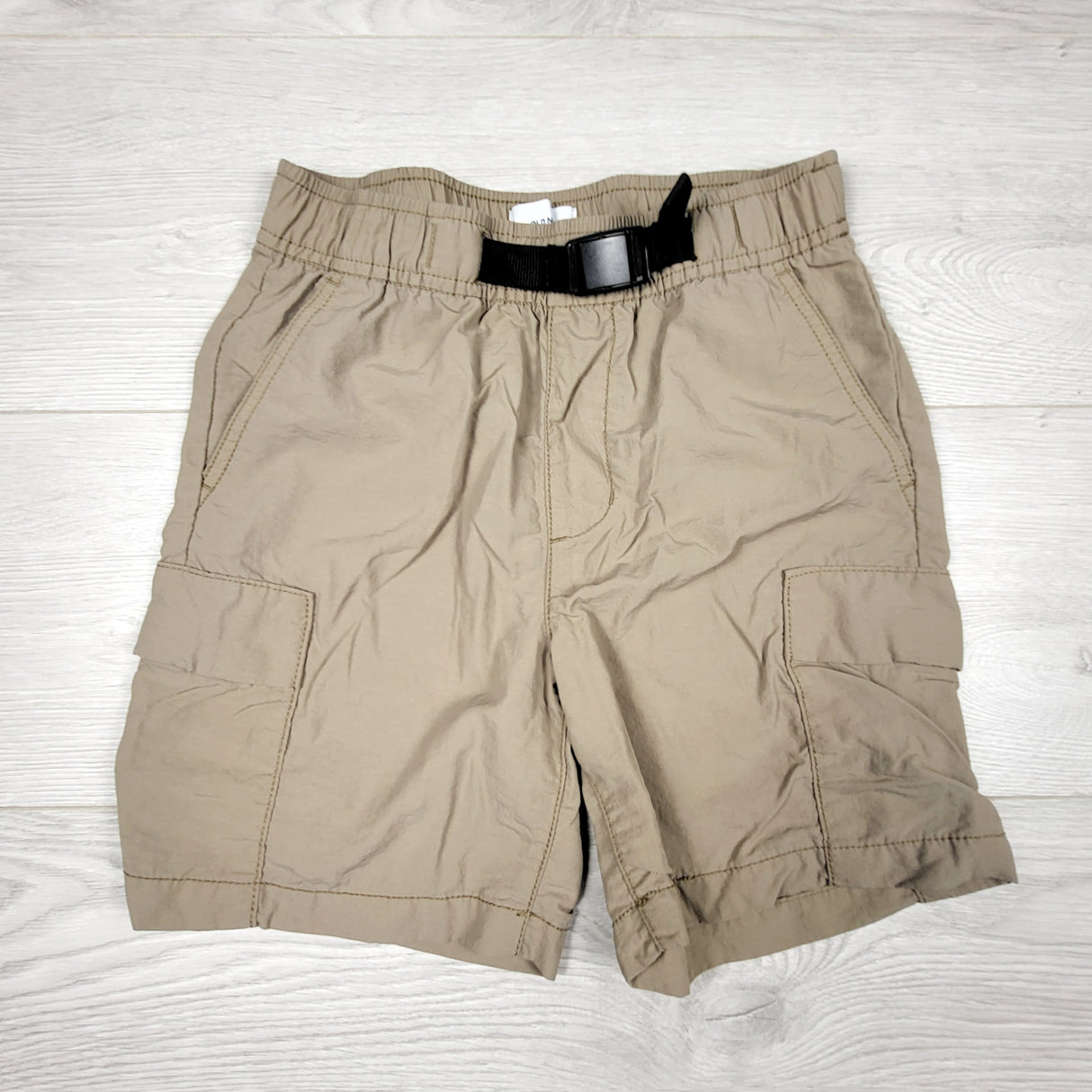 Old Navy dark beige board shorts. Size 8