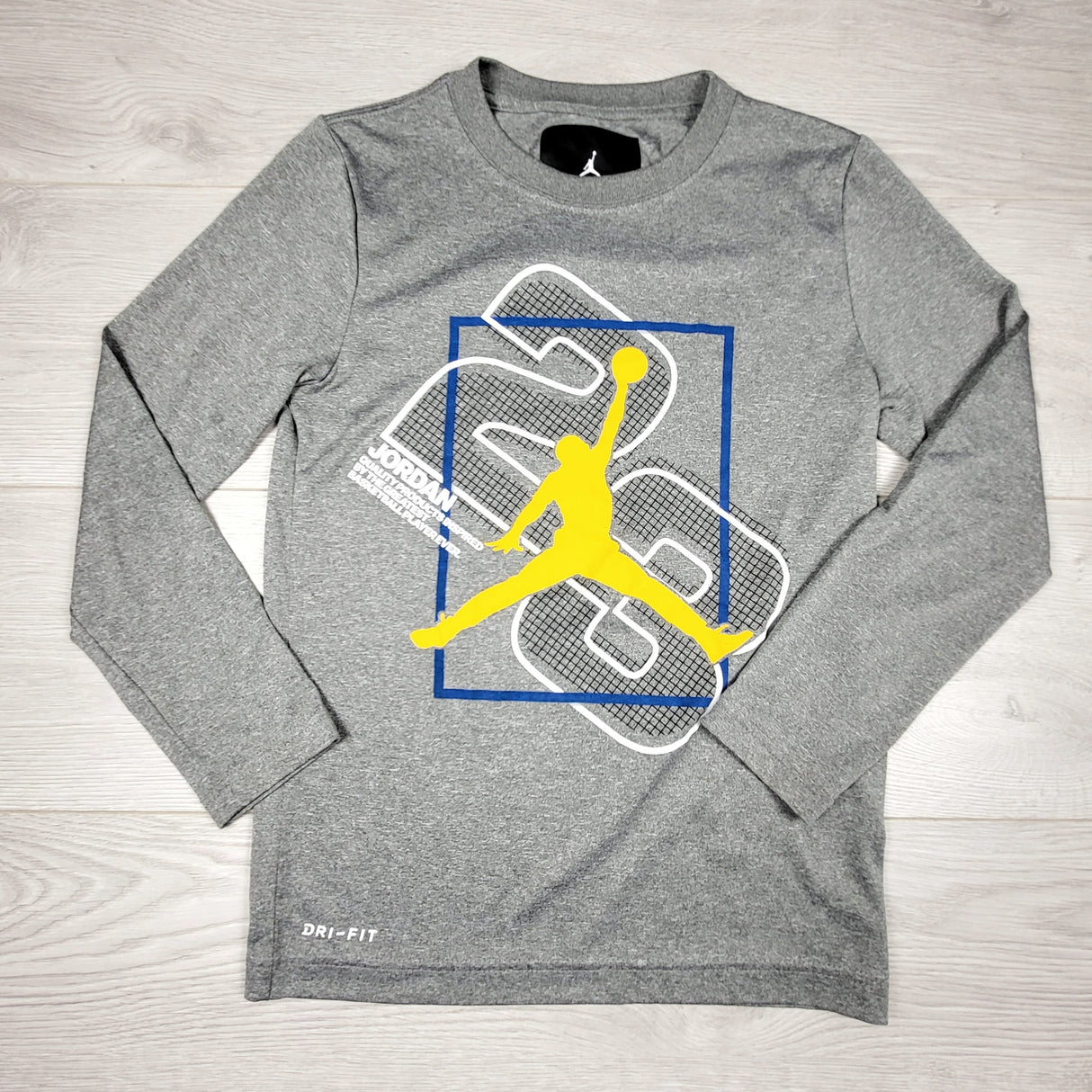 Nike grey Air Jordan "23" Jumpman active long sleeved top. Size 8-10 Years