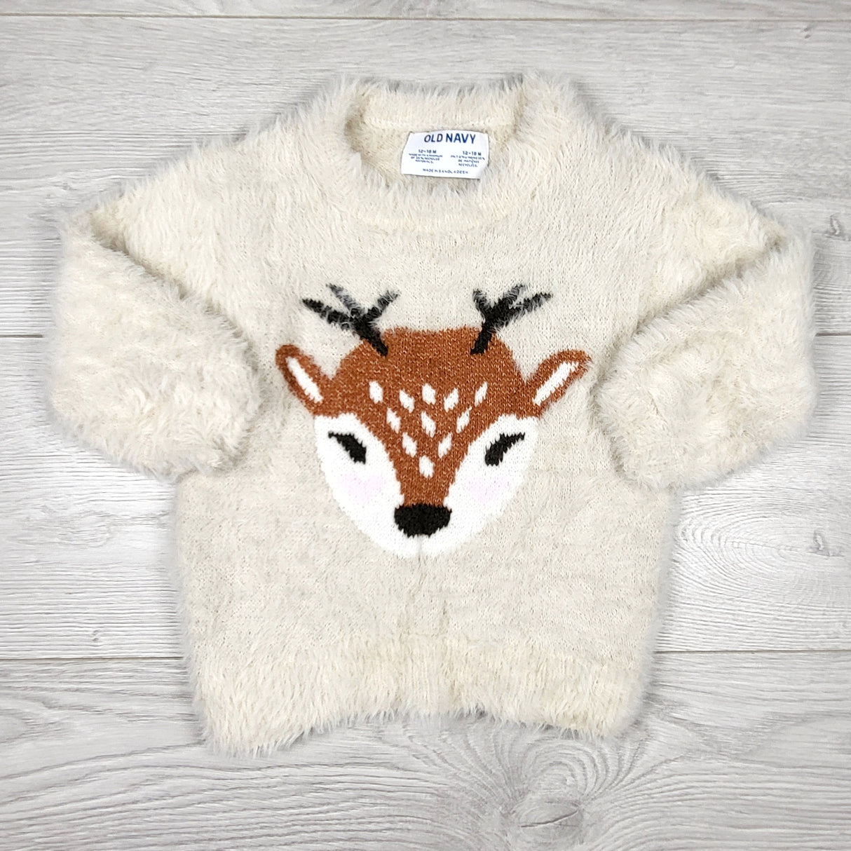 Old Navy super soft faux fur reindeer sweater. Size 12-18 months